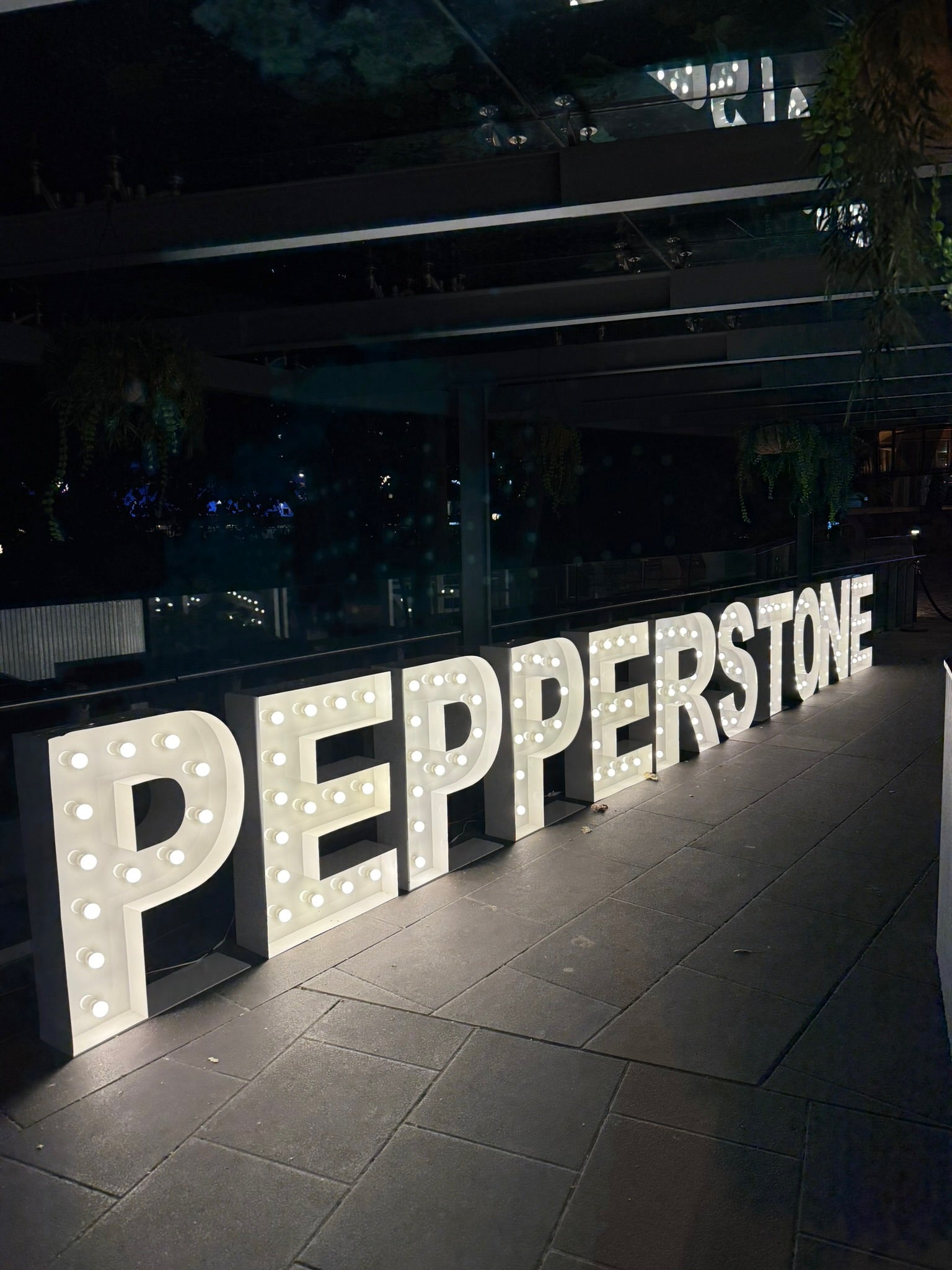 Large illuminated letters spelling 'PEPPERSTONE' in Federation Square