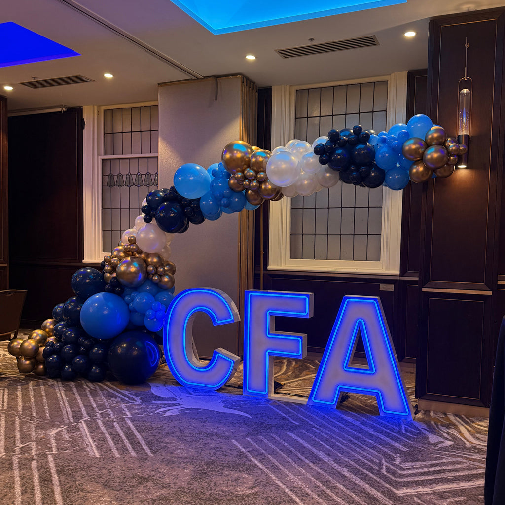 Corporate Neon Light Up Letters spelling CFA in Melbourne CBD. Blue Neon Letters for Hire. 