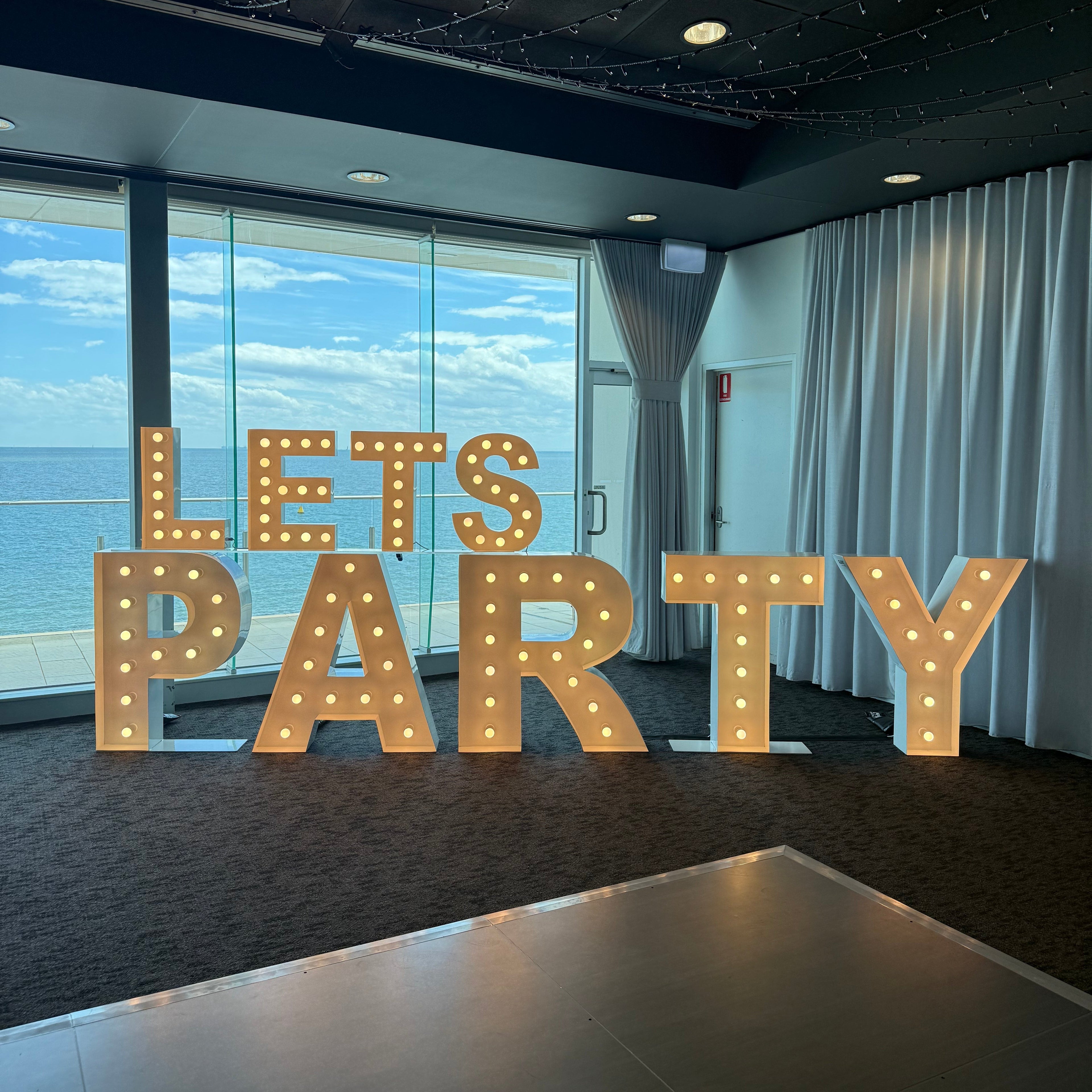1 metre warm white Event Letters. Lets Party light up letters at a wedding in Sandringham