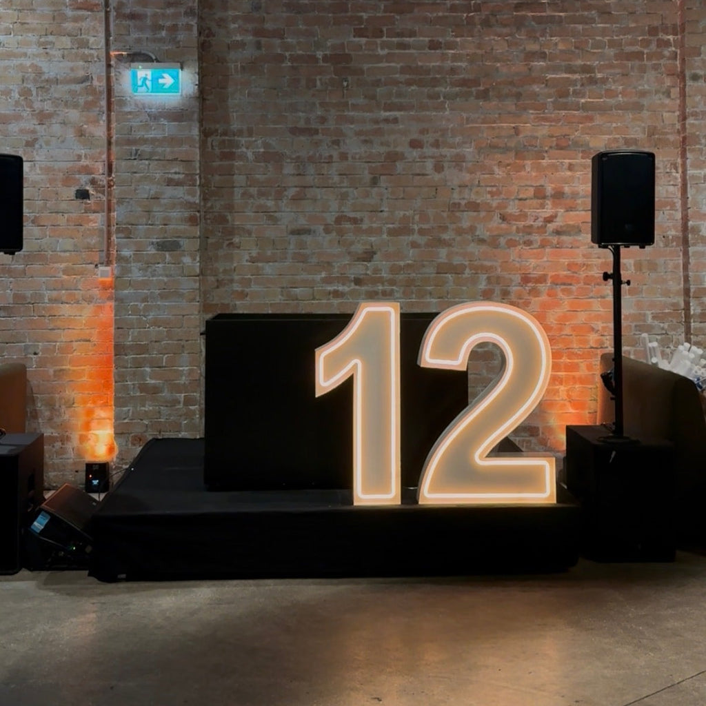 Giant Light Up Neon Numbers '12' for a Batmitzvah event in South Melbourne. Light Up Neon Number Hire 