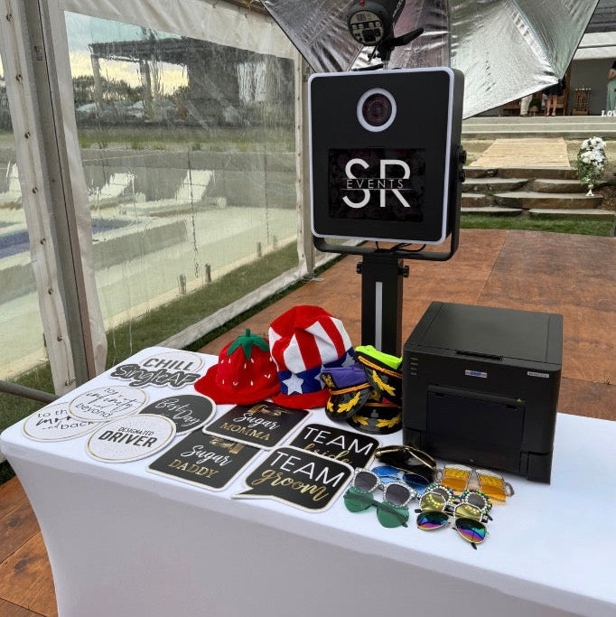 Photobooth hire Melbourne. Photobooth setup with props and branding at an outdoor event in Melbourne. 