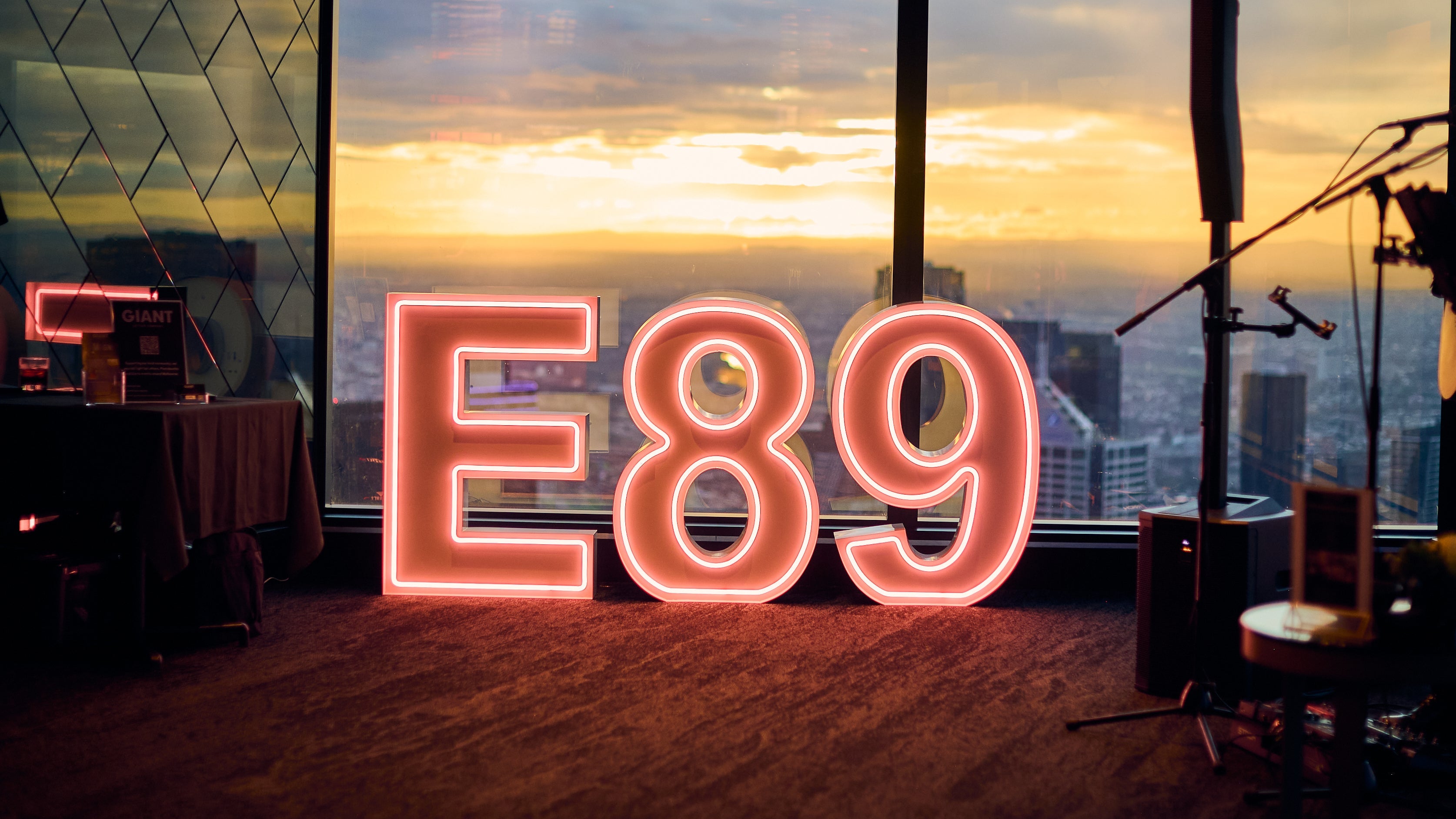 corporate light up neon letters at Eureka 89. Overlooking Melbourne sky, giant light up neon letters available for hire melbourne